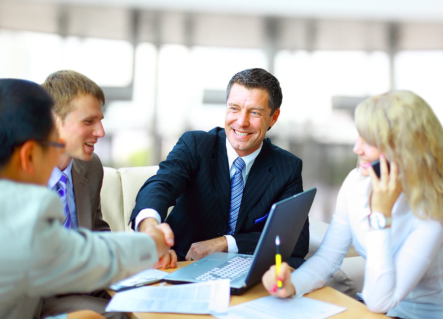 bigstock-Business-people-shaking-hands-13869770